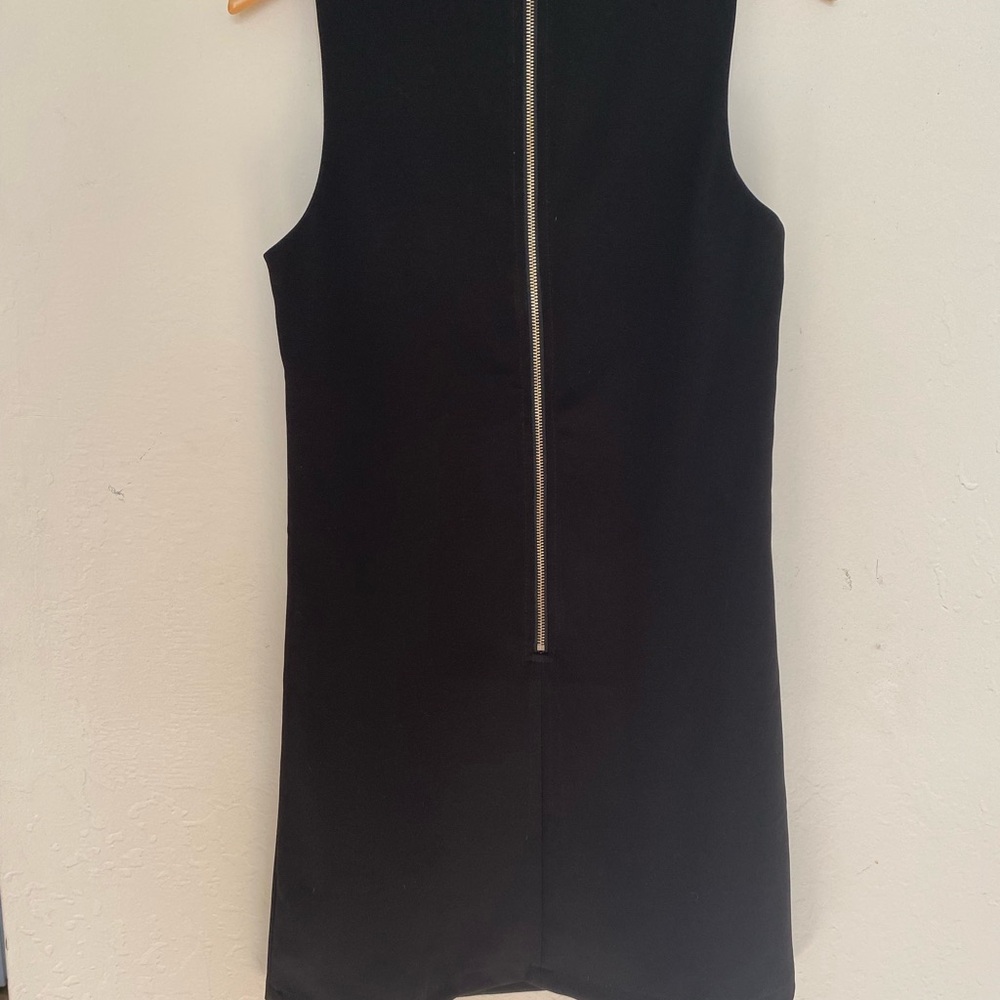 Black laser-cut dress, knee length, lined, polyester, A-line, sleeveless